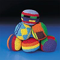  ball is filled with small plastic pellets. 12 hacky sack/foot bags